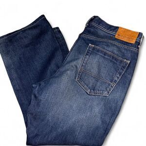 Vintage Tommy Hilfiger blue denim‎ bootcut jeans with leather patch Size 40 X 30